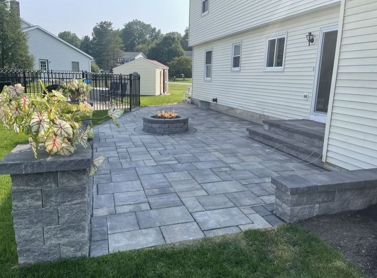 Gray paver patio with fire pit